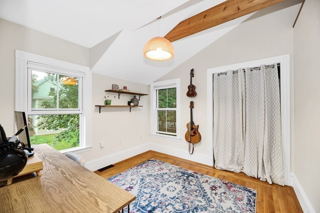 79 Harvard Avenue Boston, MA 02136 - Photo 20 of 33 a bedroom with furniture and a window