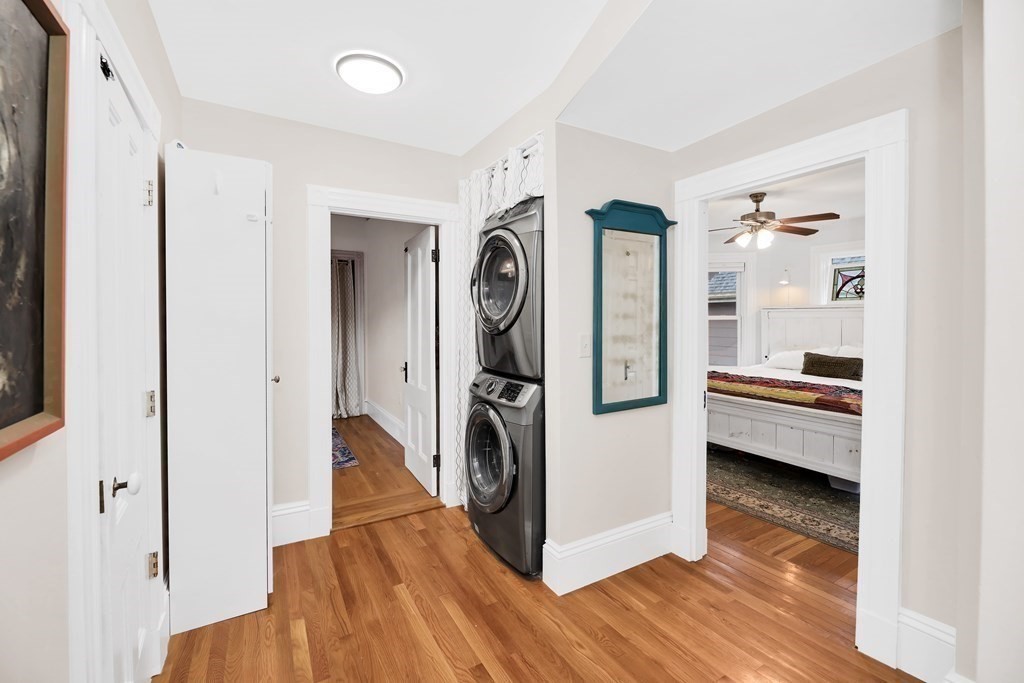 79 Harvard Avenue Boston, MA 02136 - Photo 22 of 33 a view of a storage and utility room with washer and dryer
