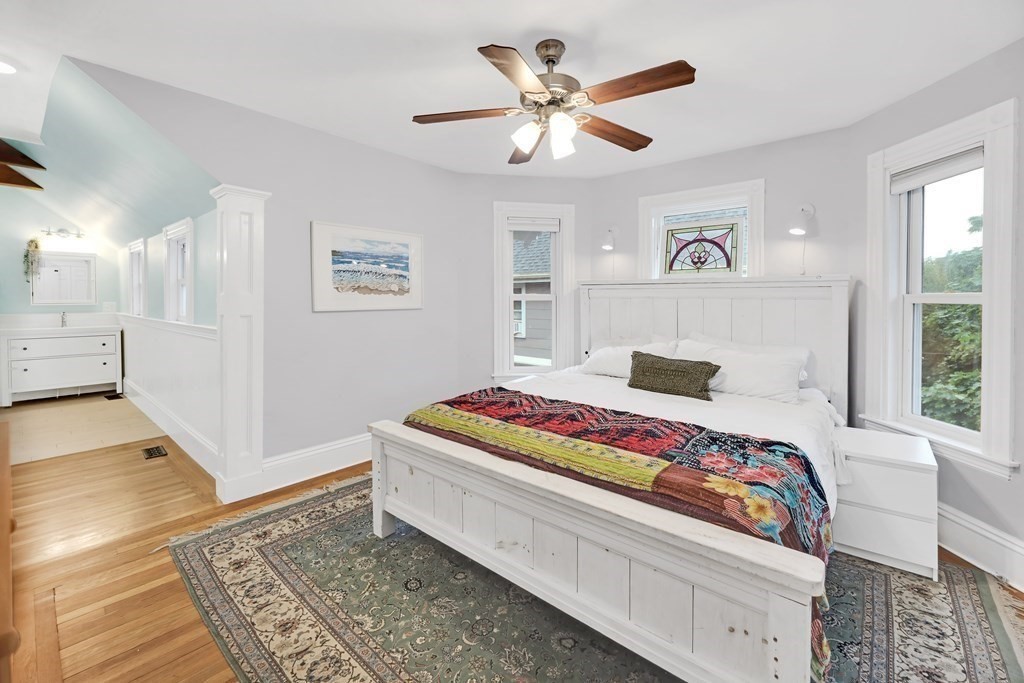 79 Harvard Avenue Boston, MA 02136 - Photo 23 of 33 a bedroom with a bed and a window