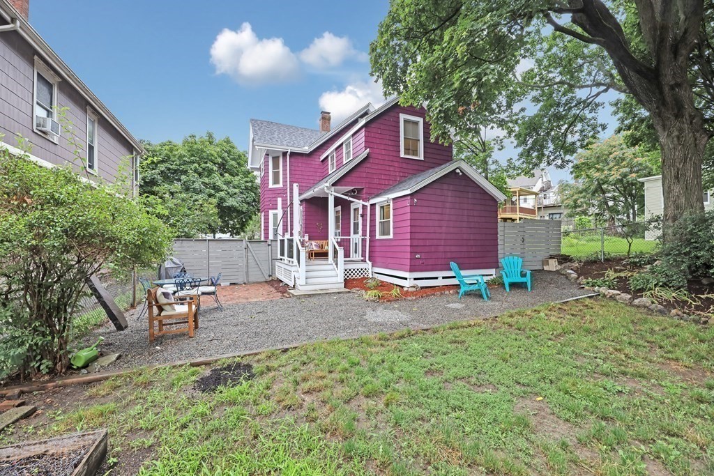 79 Harvard Avenue Boston, MA 02136 - Photo 31 of 33 a view of a house with a yard and sitting area