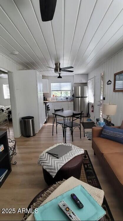 6 County Road, Unit 4 Eagar, AZ 85925 - Photo 14 of 26 a living room with furniture and a wooden floor