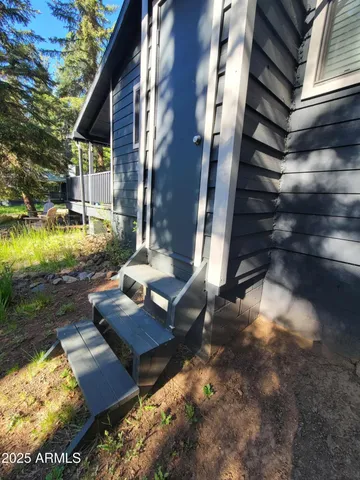 a view of swimming pool with outdoor seating