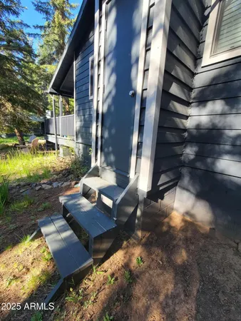 a view of swimming pool with outdoor seating