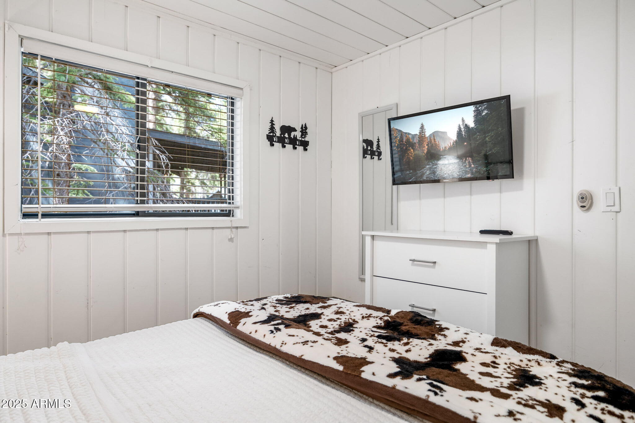 6 County Road, Unit 4 Eagar, AZ 85925 - Photo 10 of 26 a bedroom with a bed and a window