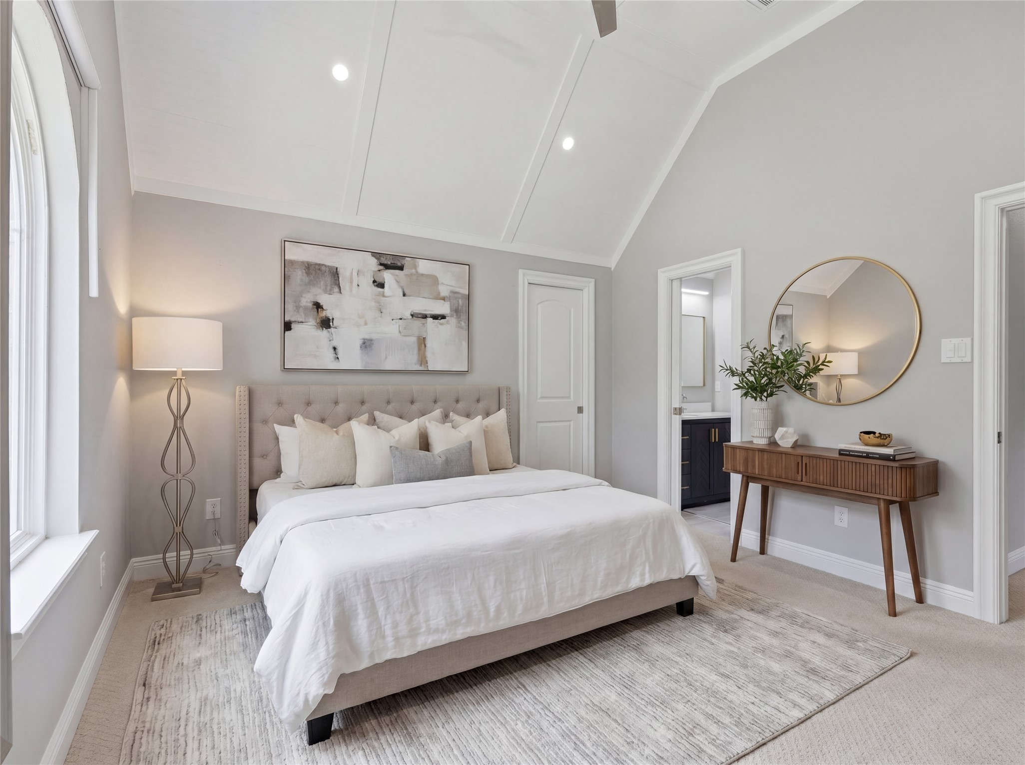 7106 Hampton Court Spring, TX 77389 - Photo 18 of 31 This 2nd floor guest bedroom features a vaulted ceiling, neutral tones, and ample natural light. It has an attached bathroom. (virtually staged)