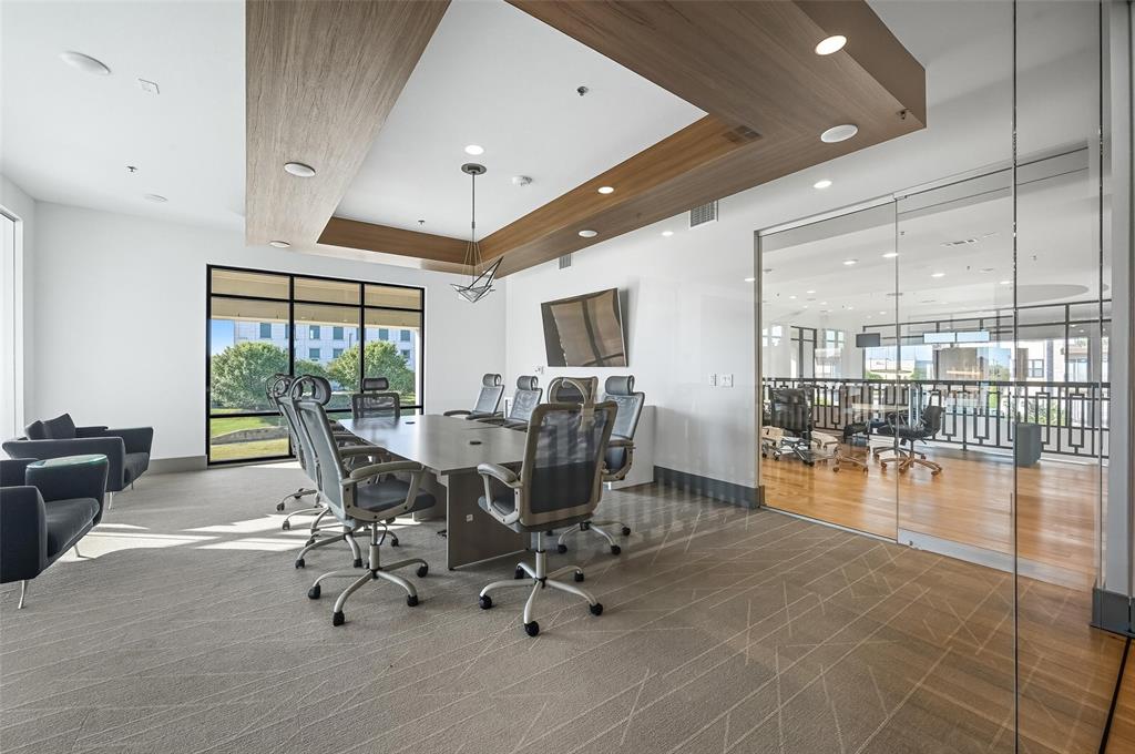 2700 Old Denton Road, Unit 3310 Carrollton, TX 75007 - Photo 12 of 21 a living room with furniture floor to ceiling window and wooden floor