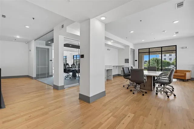 a view of a living room and dining room