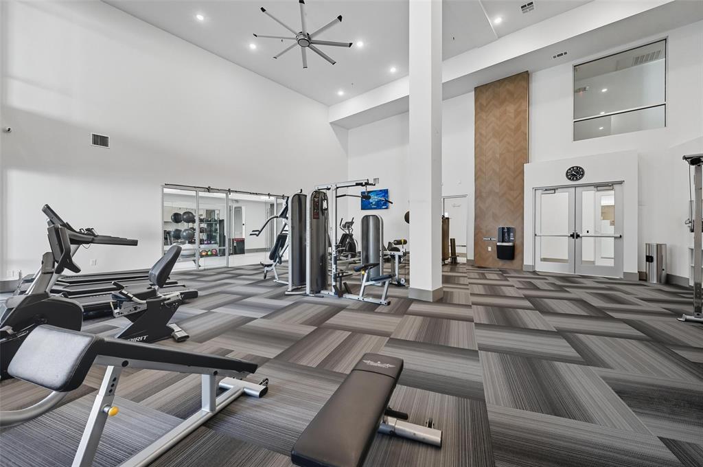 2700 Old Denton Road, Unit 3310 Carrollton, TX 75007 - Photo 16 of 21 a view of a room with gym equipment