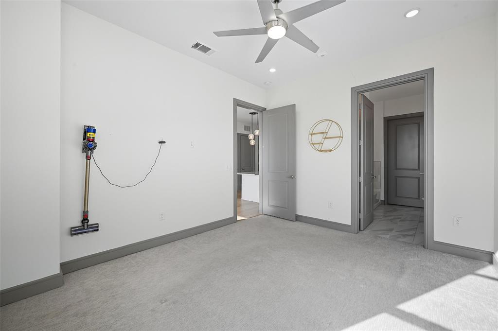 2700 Old Denton Road, Unit 3310 Carrollton, TX 75007 - Photo 6 of 21 an empty room with white walls and painted walls