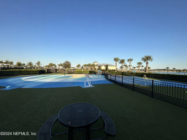 a view of a balcony with lake view and mountain view