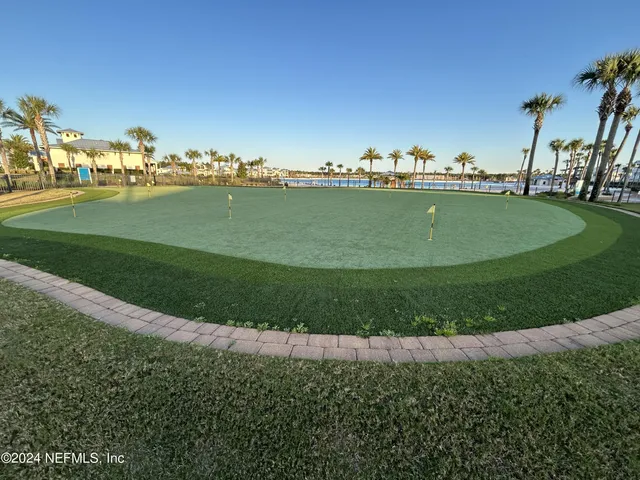 a view of a golf course with a lake