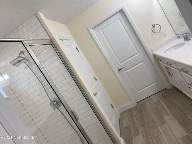 a balcony with wooden floor