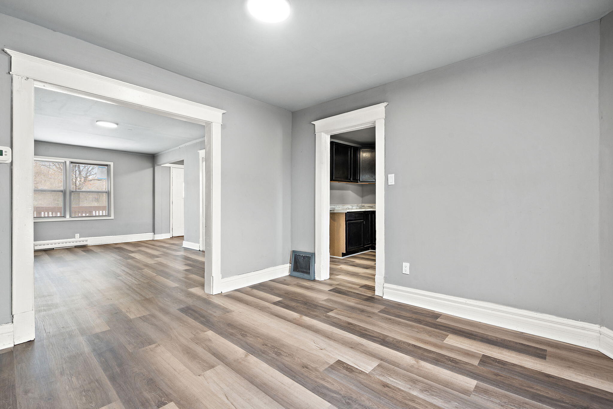 565 Jackson Street Gary, IN 46402 - Photo 11 of 24 a view of a livingroom with wooden floor