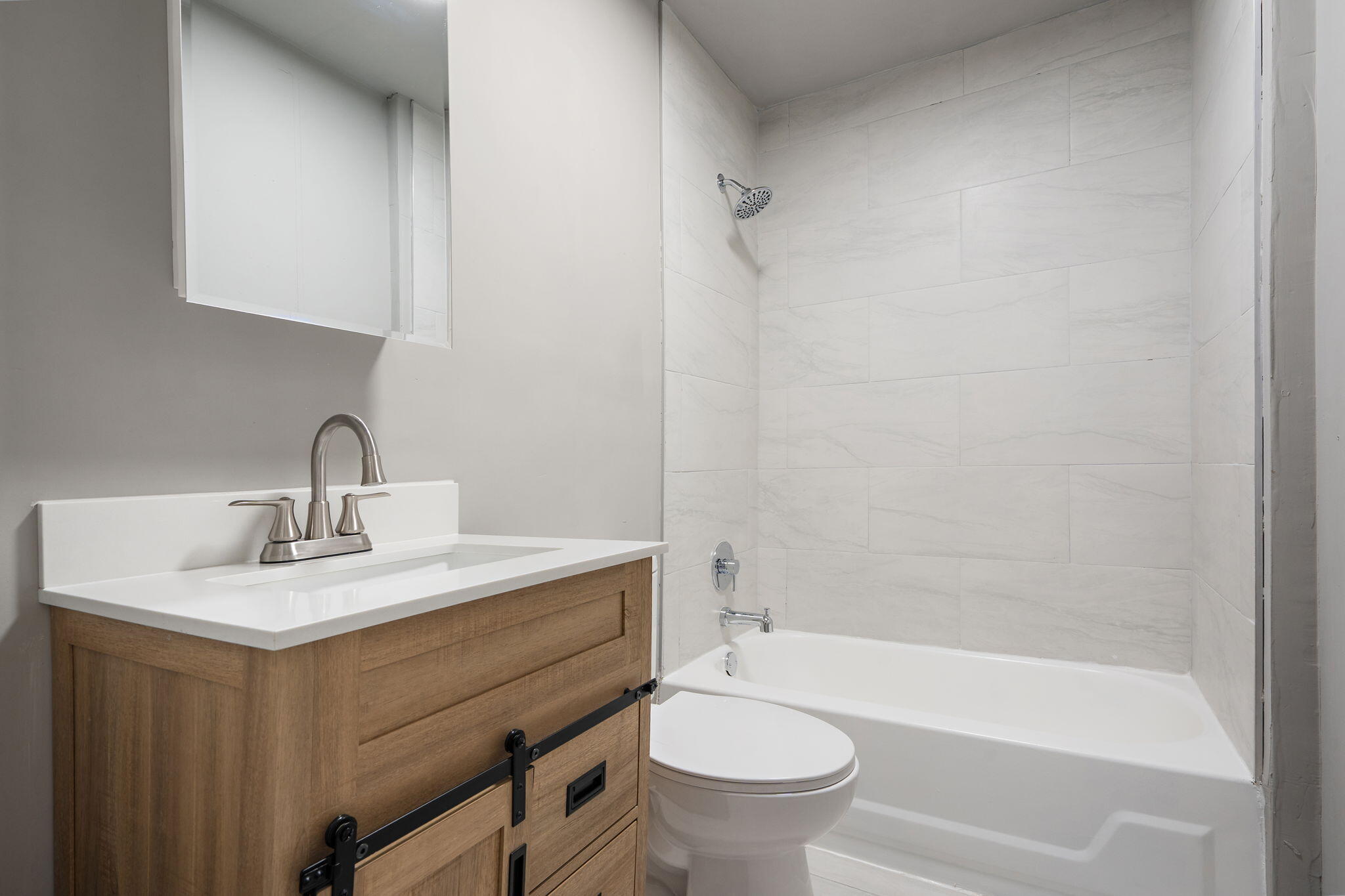 565 Jackson Street Gary, IN 46402 - Photo 16 of 24 a bathroom with a sink toilet and bathtub