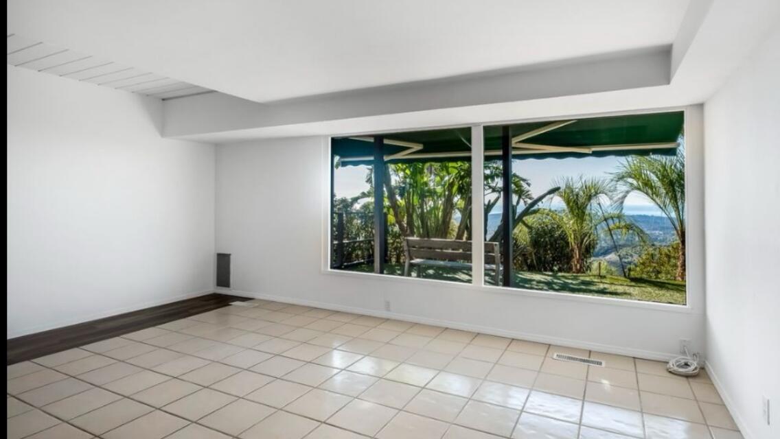 2911 Holly Road Santa Barbara, CA 93105 - Photo 16 of 20 an empty room with windows and outdoor view