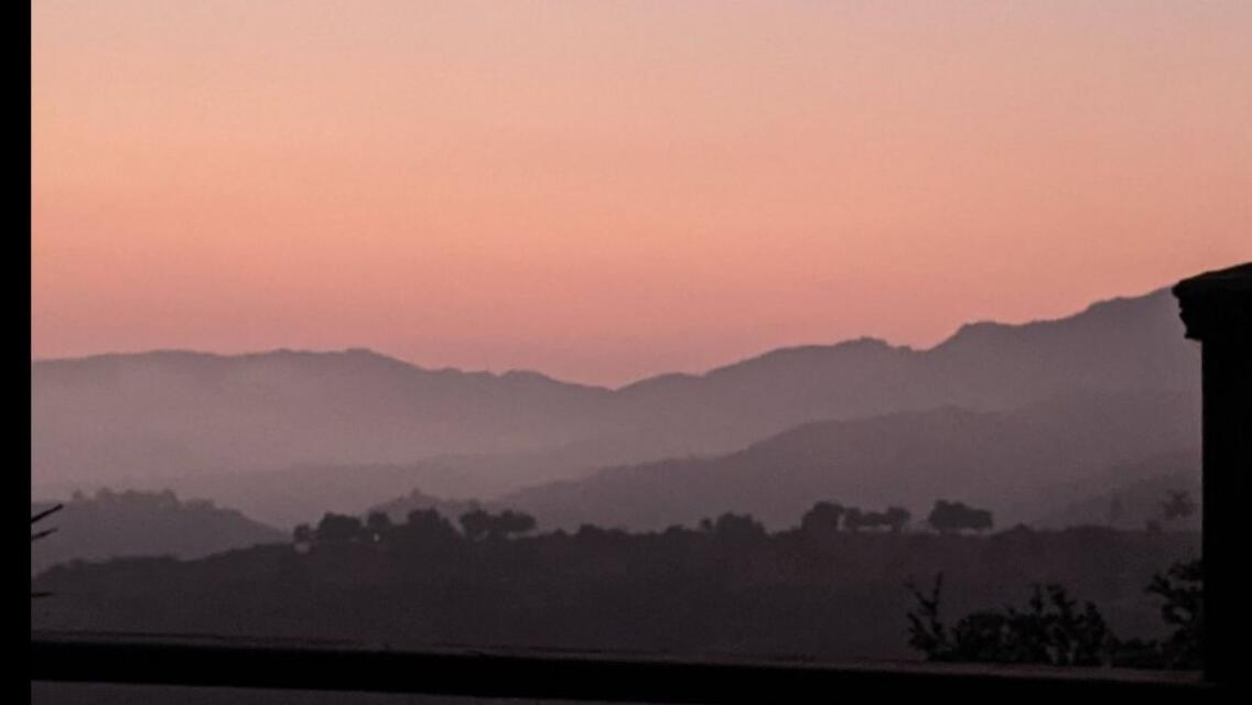 2911 Holly Road Santa Barbara, CA 93105 - Photo 20 of 20 a view of mountain with sunset in background