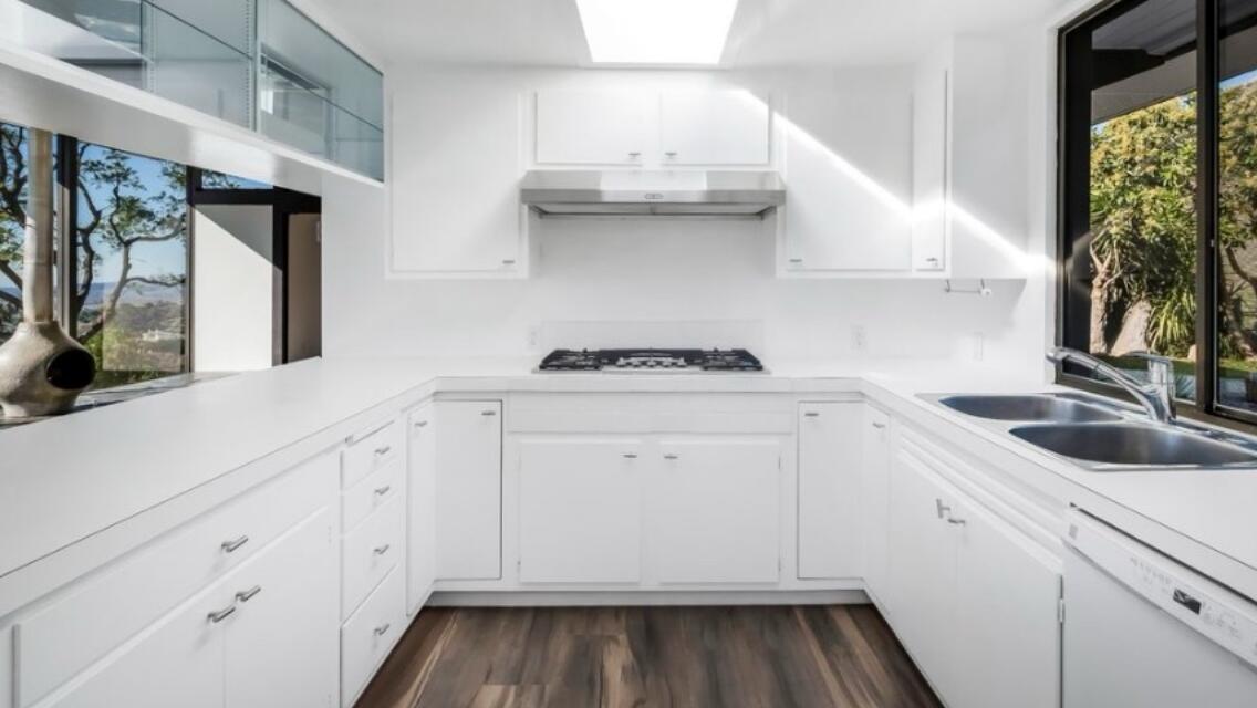 2911 Holly Road Santa Barbara, CA 93105 - Photo 10 of 20 a kitchen with granite countertop a sink and a stove