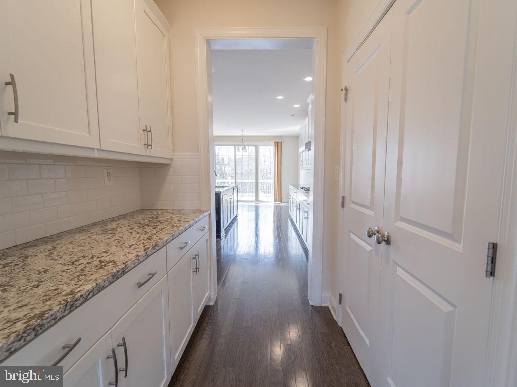 22595 Windsor Locks Square Ashburn, VA 20148 - Photo 34 of 56 wooden floor in an empty room
