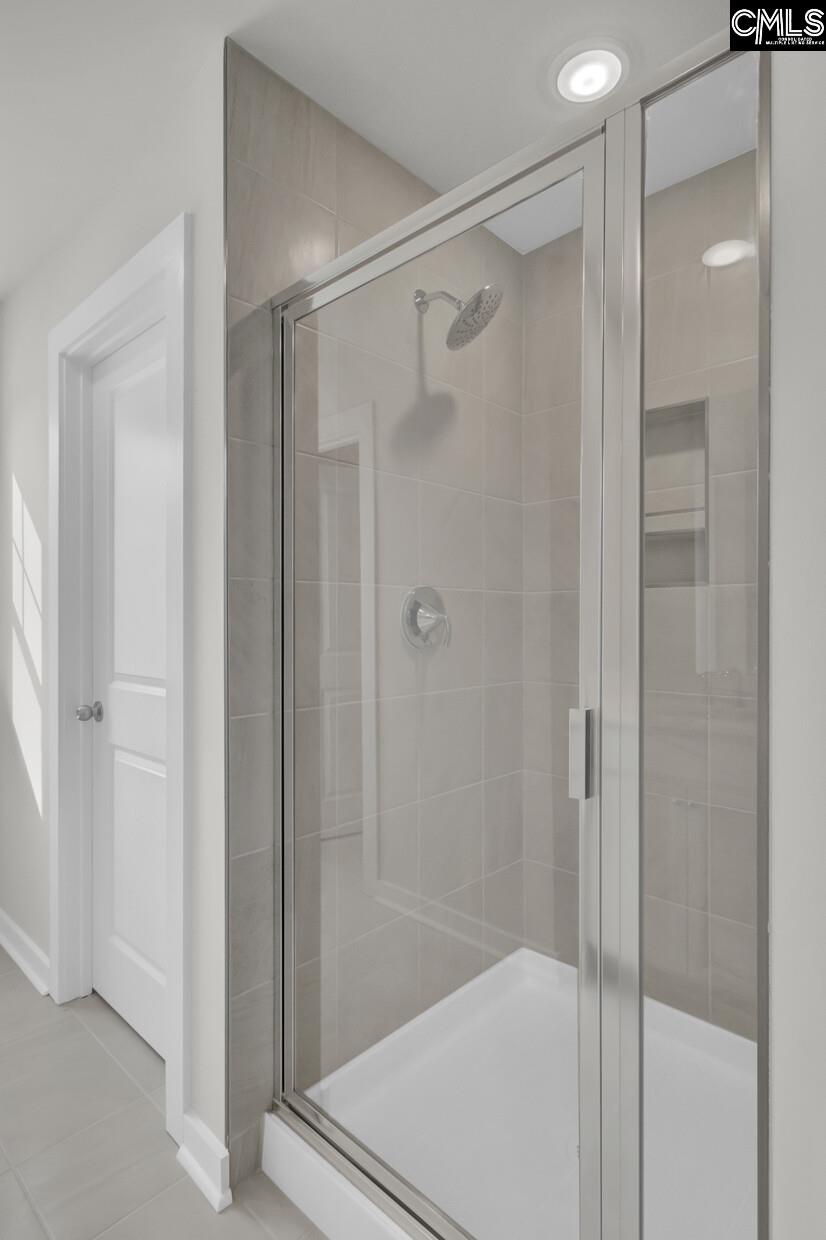 320 Brass Billion Path Lexington, SC 29073 - Photo 20 of 39 a bathroom with a shower and a glass door