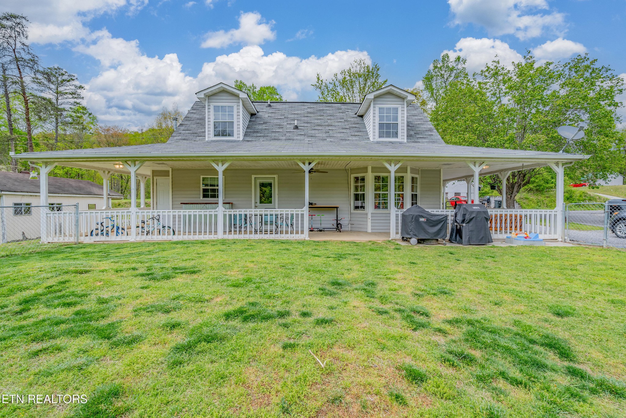 632 Butler Mill Road Oliver Springs, TN 37840 - Photo 28 of 34 front view of a house with a big yard
