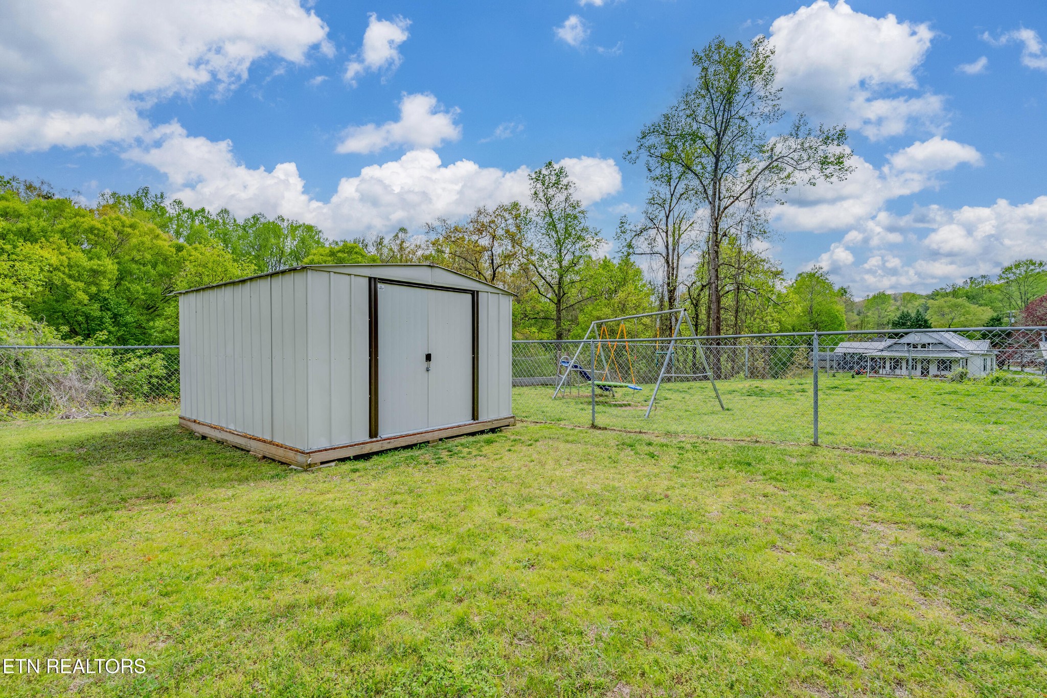 632 Butler Mill Road Oliver Springs, TN 37840 - Photo 33 of 34 a view of a backyard with a garden