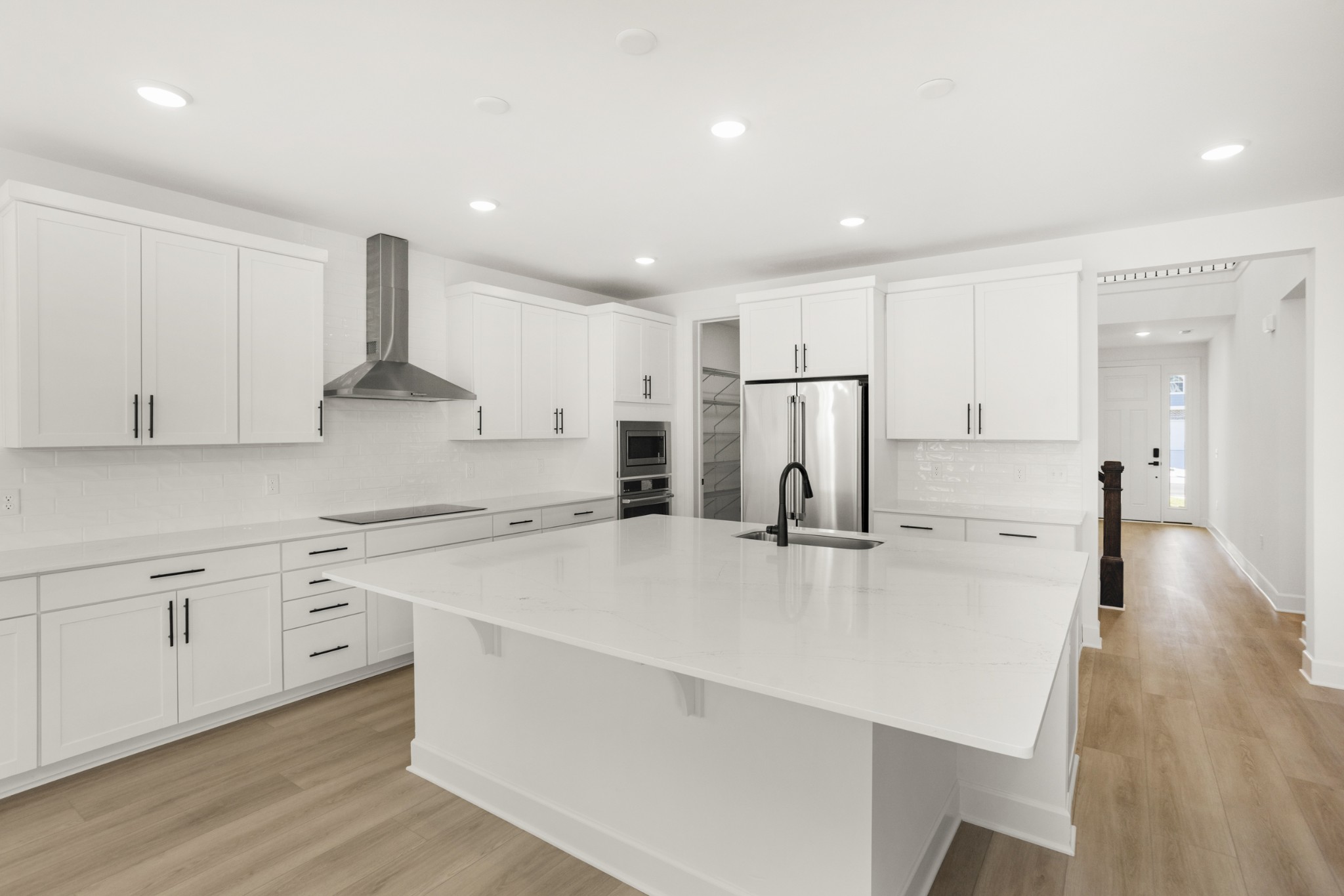 205 Acmon Blue Road Mount Juliet, TN 37122 - Photo 17 of 64 a kitchen with stainless steel appliances a refrigerator sink and white cabinets