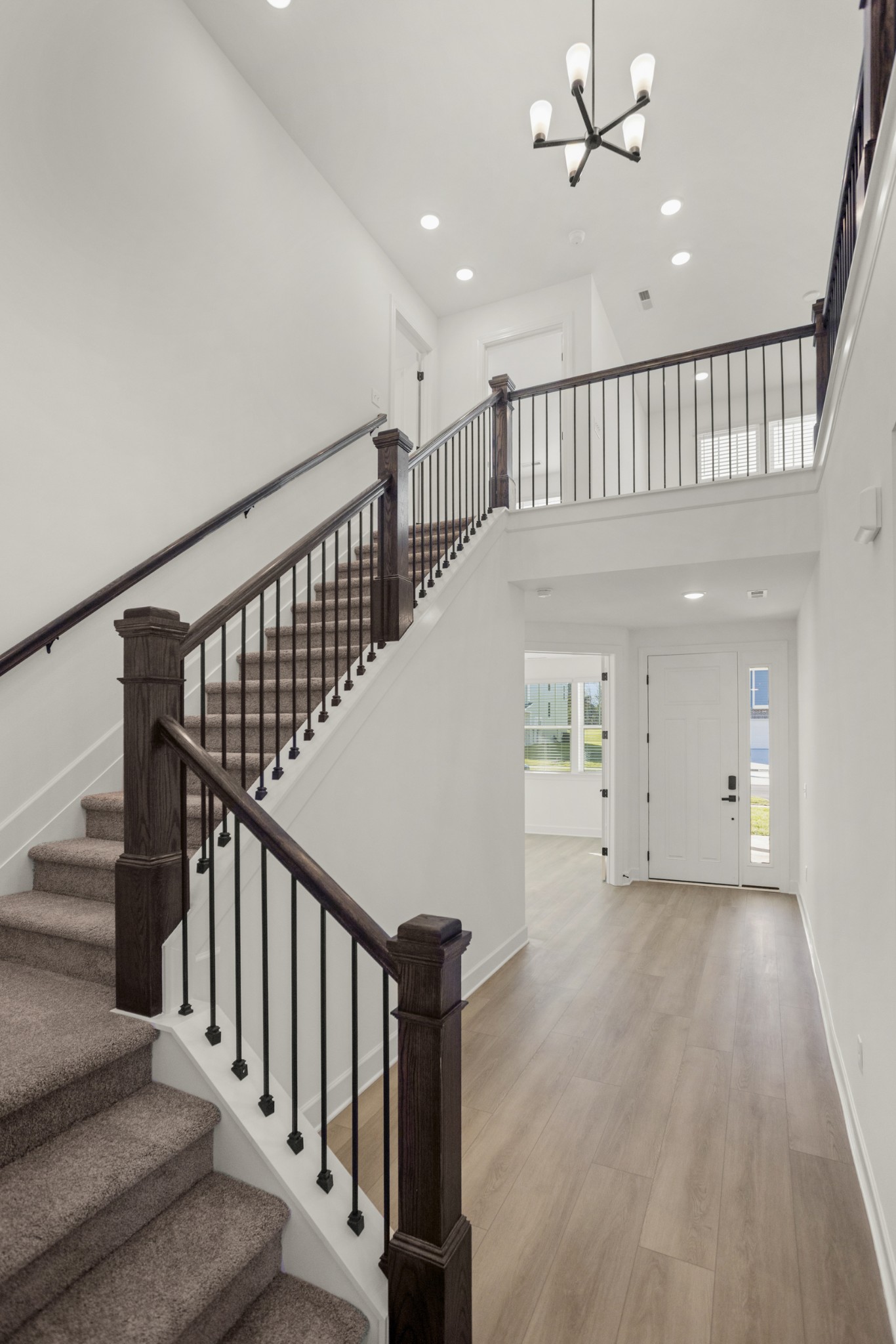 205 Acmon Blue Road Mount Juliet, TN 37122 - Photo 24 of 64 a view of staircase with wooden floor and fan