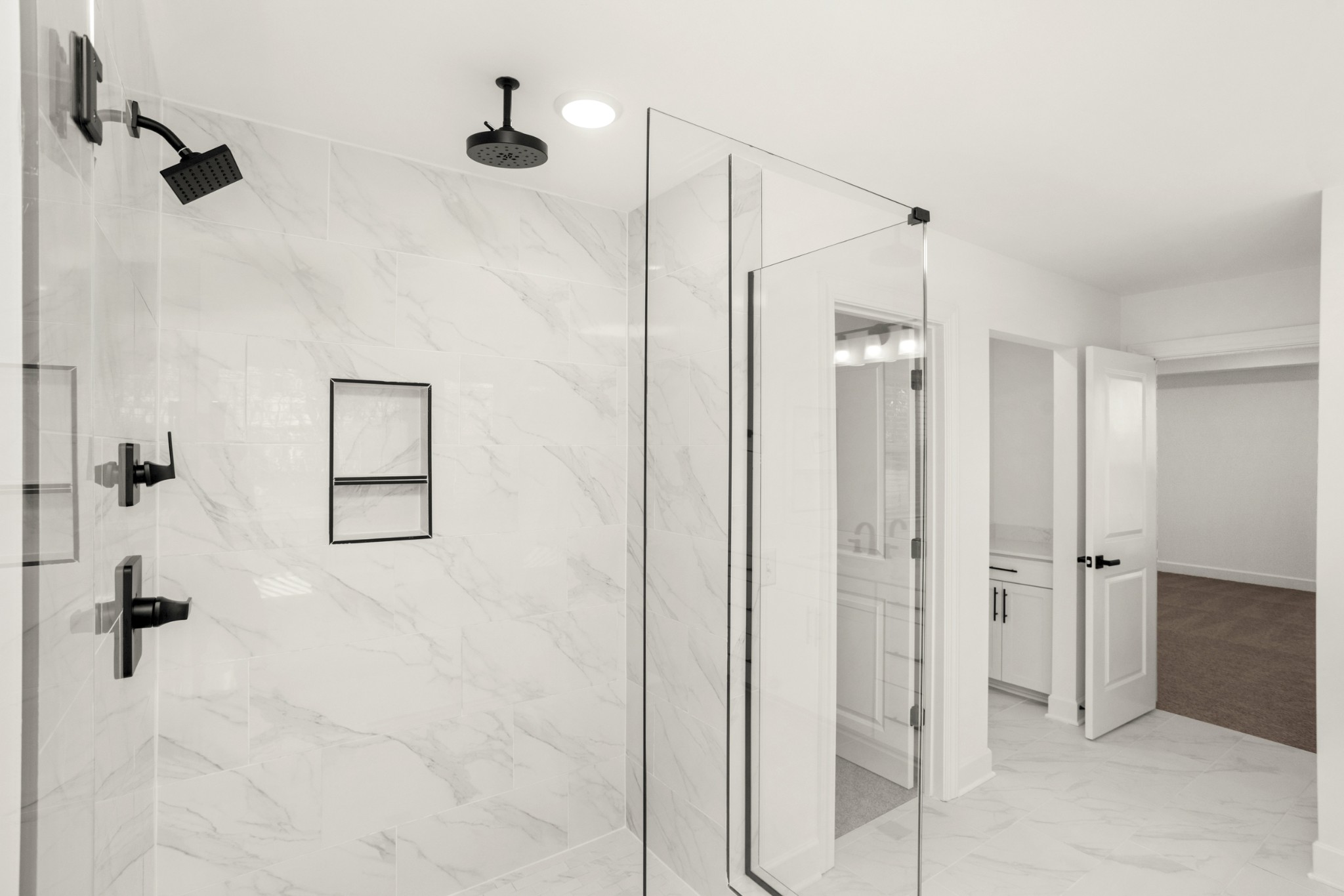 205 Acmon Blue Road Mount Juliet, TN 37122 - Photo 39 of 64 a bathroom with a shower and a glass door