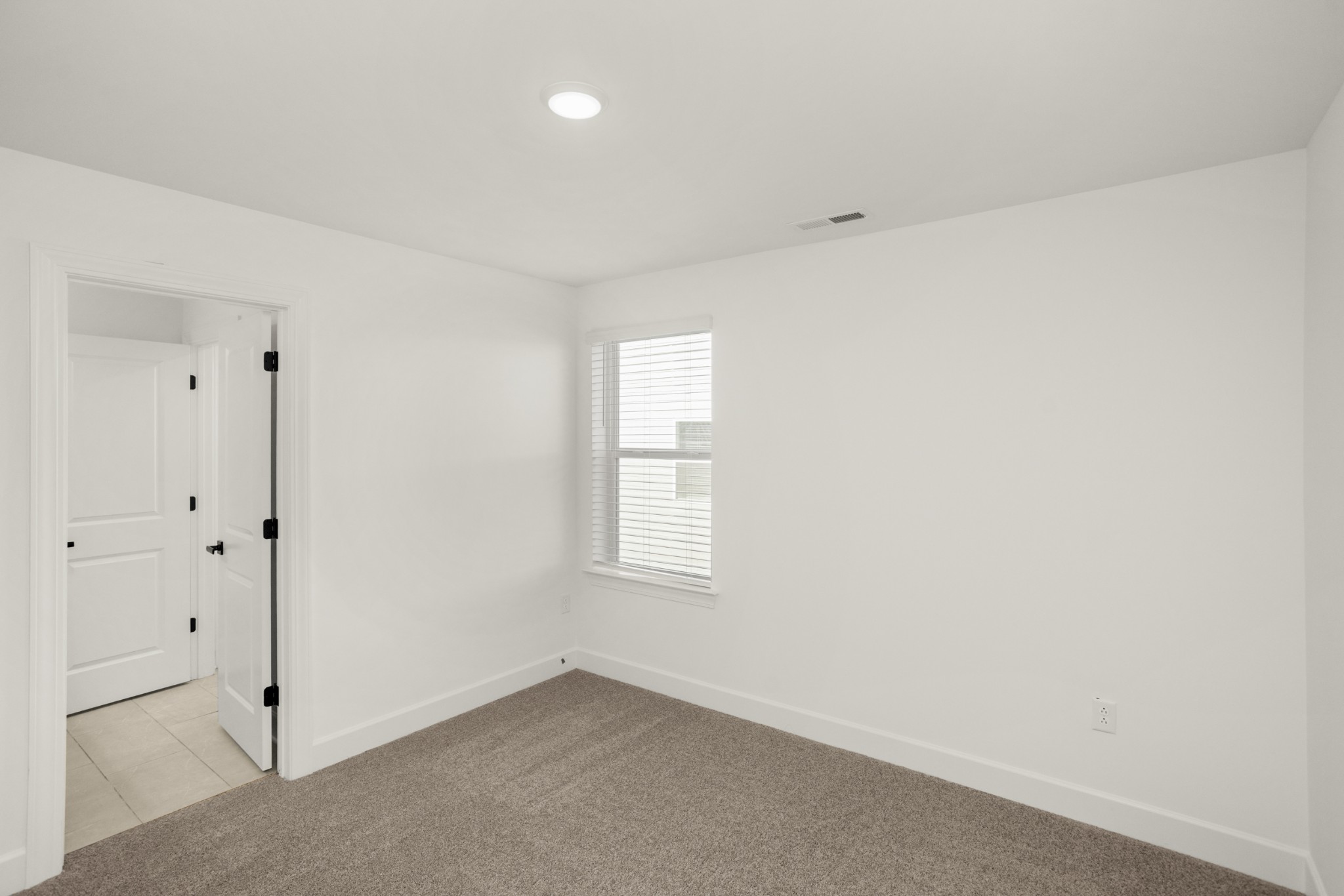 205 Acmon Blue Road Mount Juliet, TN 37122 - Photo 40 of 64 an empty room with windows and closet