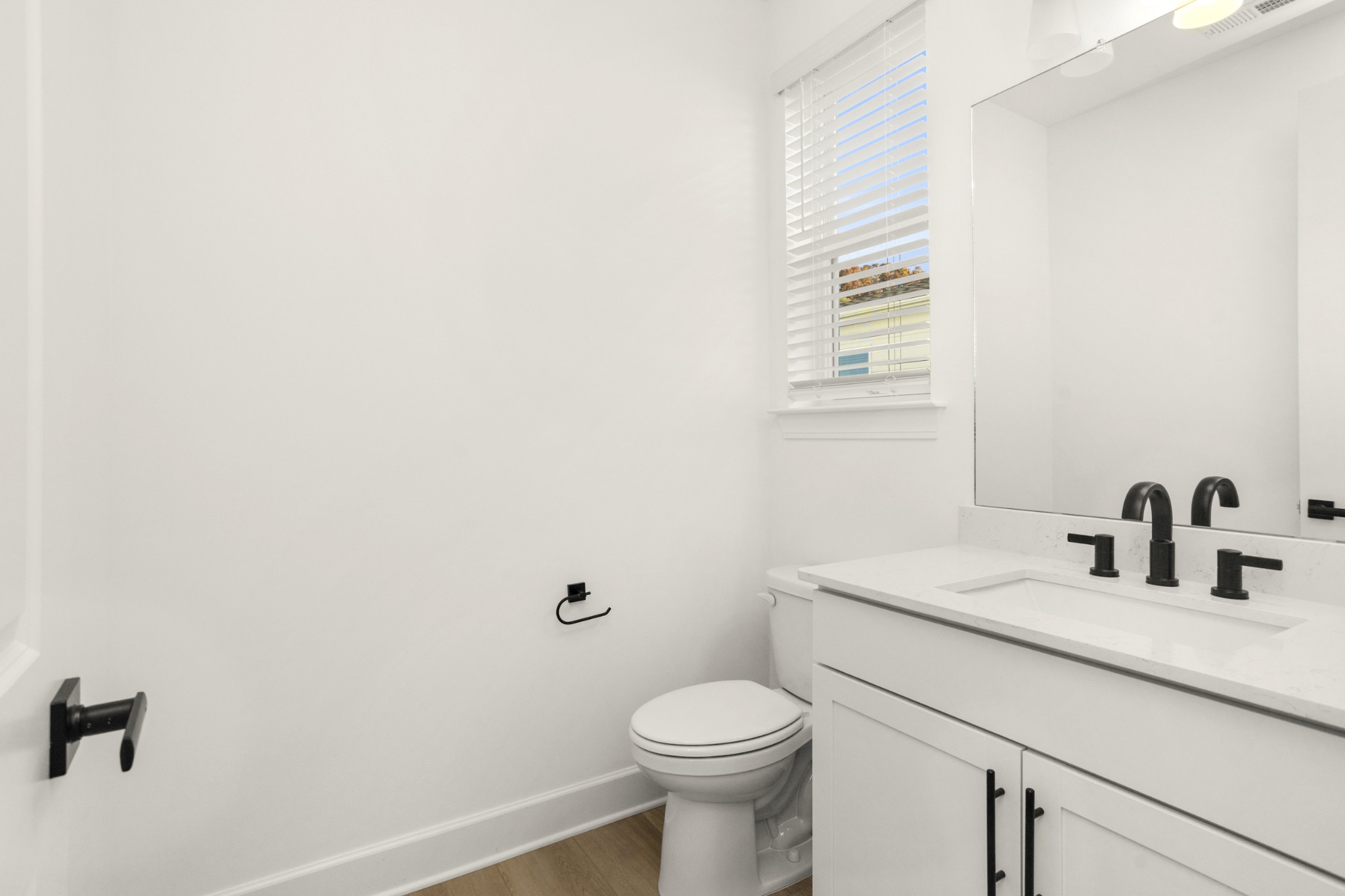205 Acmon Blue Road Mount Juliet, TN 37122 - Photo 8 of 64 a bathroom with a sink a toilet and mirror