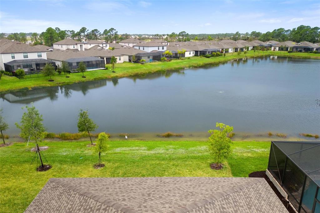 19729 Fishhawk Trail Venice, FL 34293 - Photo 39 of 45 a view of a lake with a city