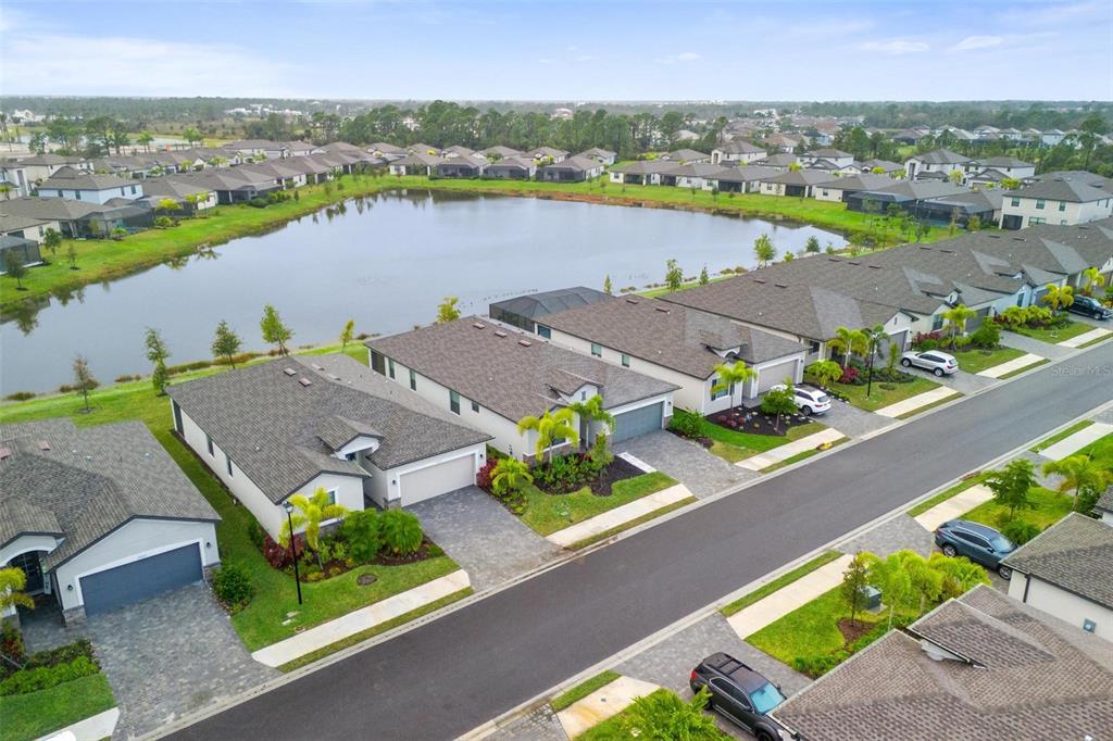 19729 Fishhawk Trail Venice, FL 34293 - Photo 43 of 45 an aerial view of a house with a lake view