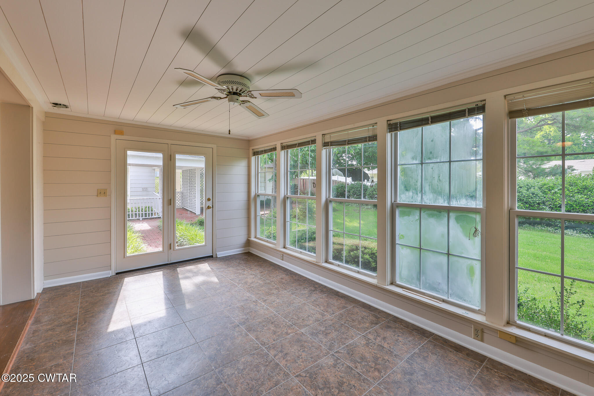 103 West Main Street Greenfield, TN 38230 - Photo 21 of 25 a view of an empty room with windows and pool table