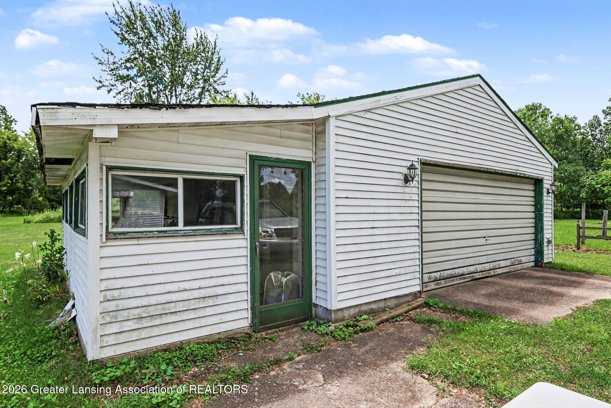 5645 Rossman Road Onondaga, MI 49264 - Photo 29 of 32 Garage with Enclosed space