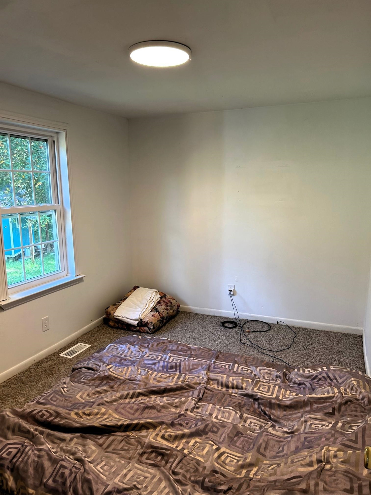 1507 Wilson Road Clinton, NC 28328 - Photo 33 of 49 a bedroom with a bed and a window