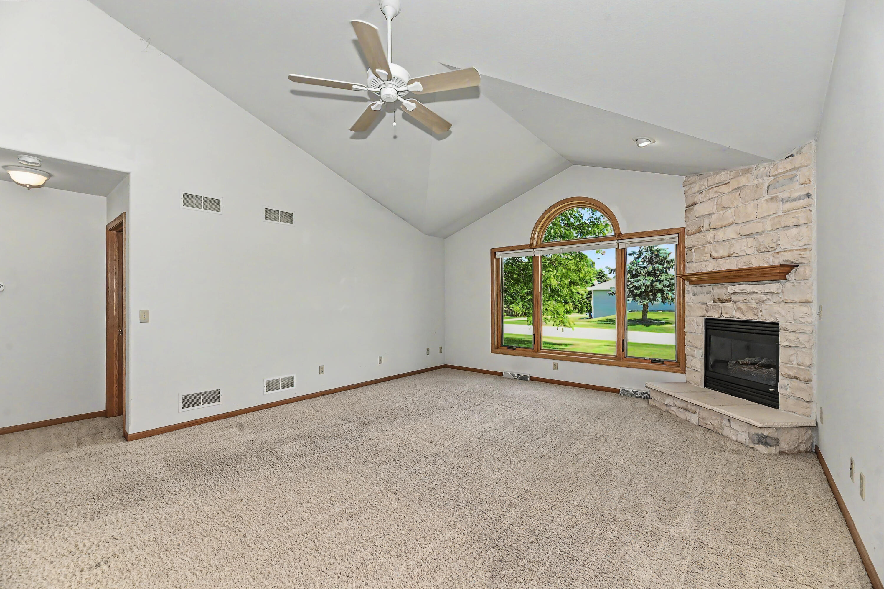 N22-w26492 Shooting Star Road, Unit 2 Pewaukee, WI 53072 - Photo 6 of 32 Living Room with gas fireplace