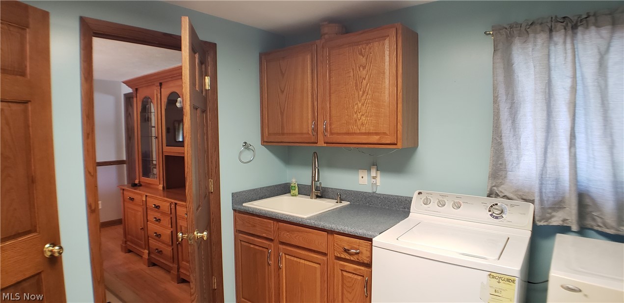 764 Center Road New Franklin, OH 44319 - Photo 16 of 34 Laundry/mud room with washtub, 1/2 bath, and extra fridge/freezer