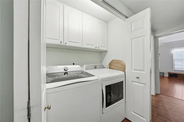 a utility room with dryer and washer