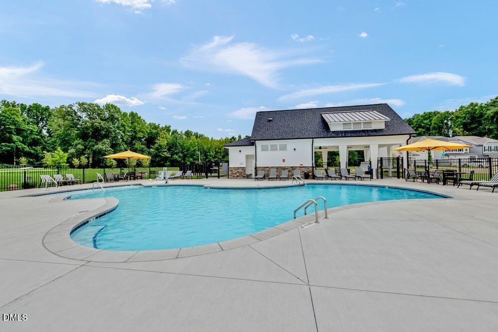 45 Shay Street Angier, NC 27501 - Photo 19 of 32 a view of a house with swimming pool