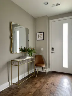 a workspace with furniture and window