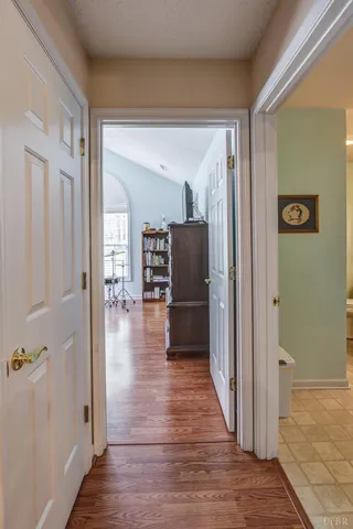 a bed room with furniture and a window