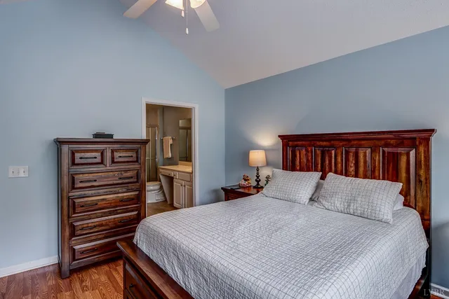 a couple of potted plants in front of door