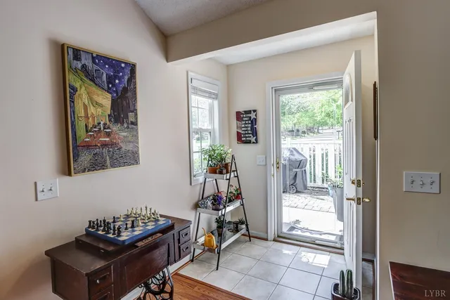 a room with furniture and gym equipment