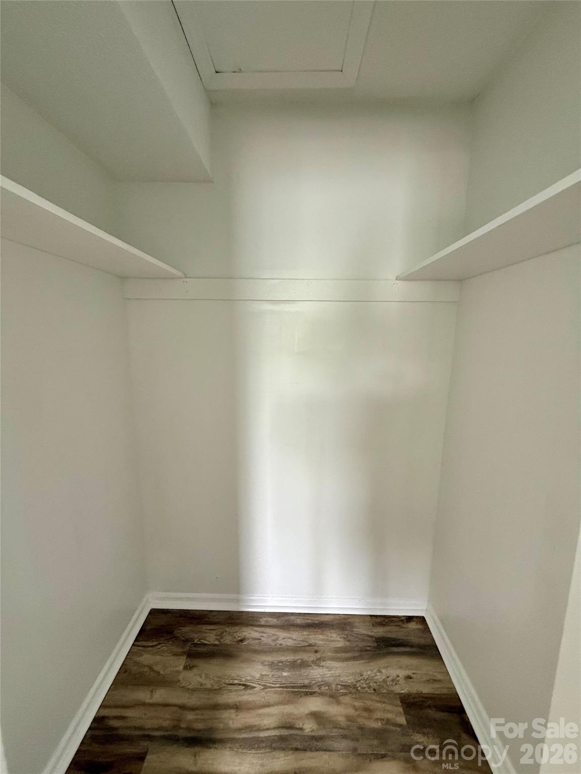 11023 Harrowfield Road Charlotte, NC 28226 - Photo 26 of 32 a view of room with wooden floor