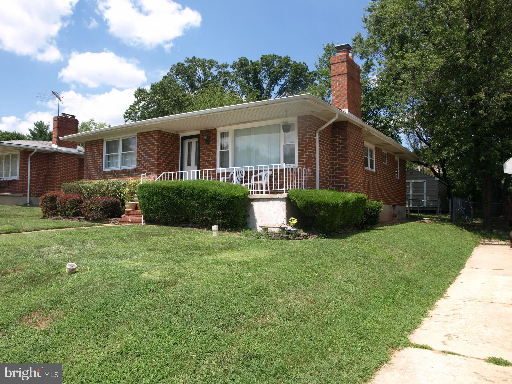 1211 Gettig Road Baltimore, MD 21237 - Photo 1 of 30 a front view of house with yard and green space