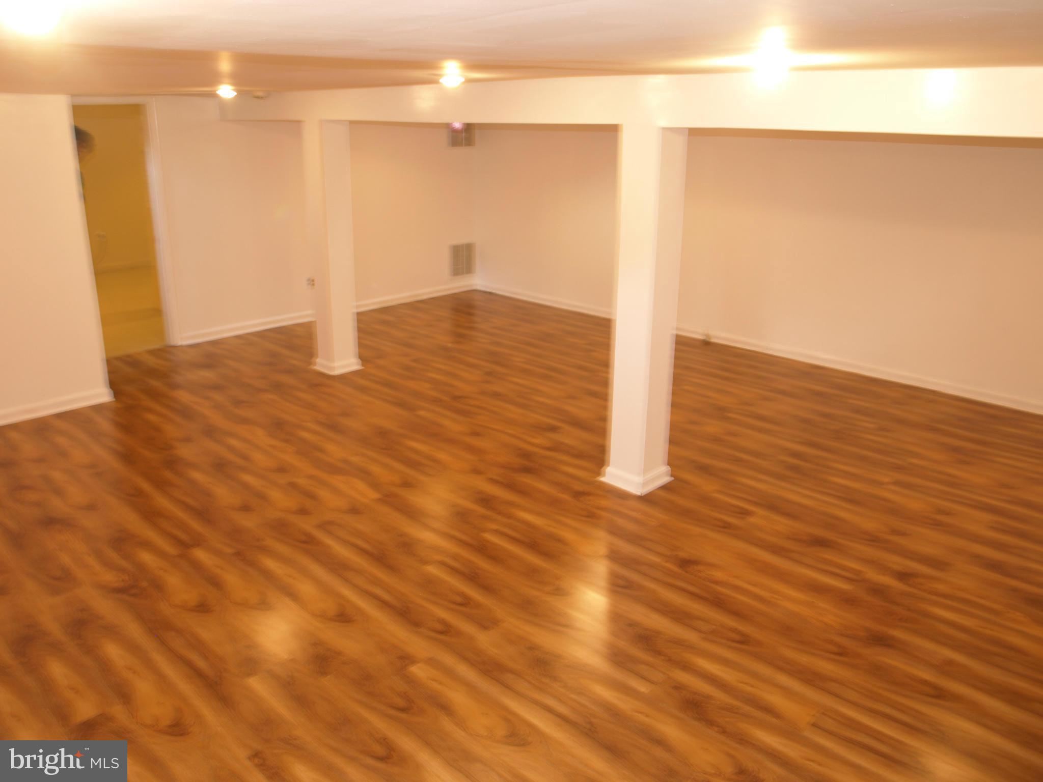 1211 Gettig Road Baltimore, MD 21237 - Photo 5 of 30 a view of a room with wooden floor