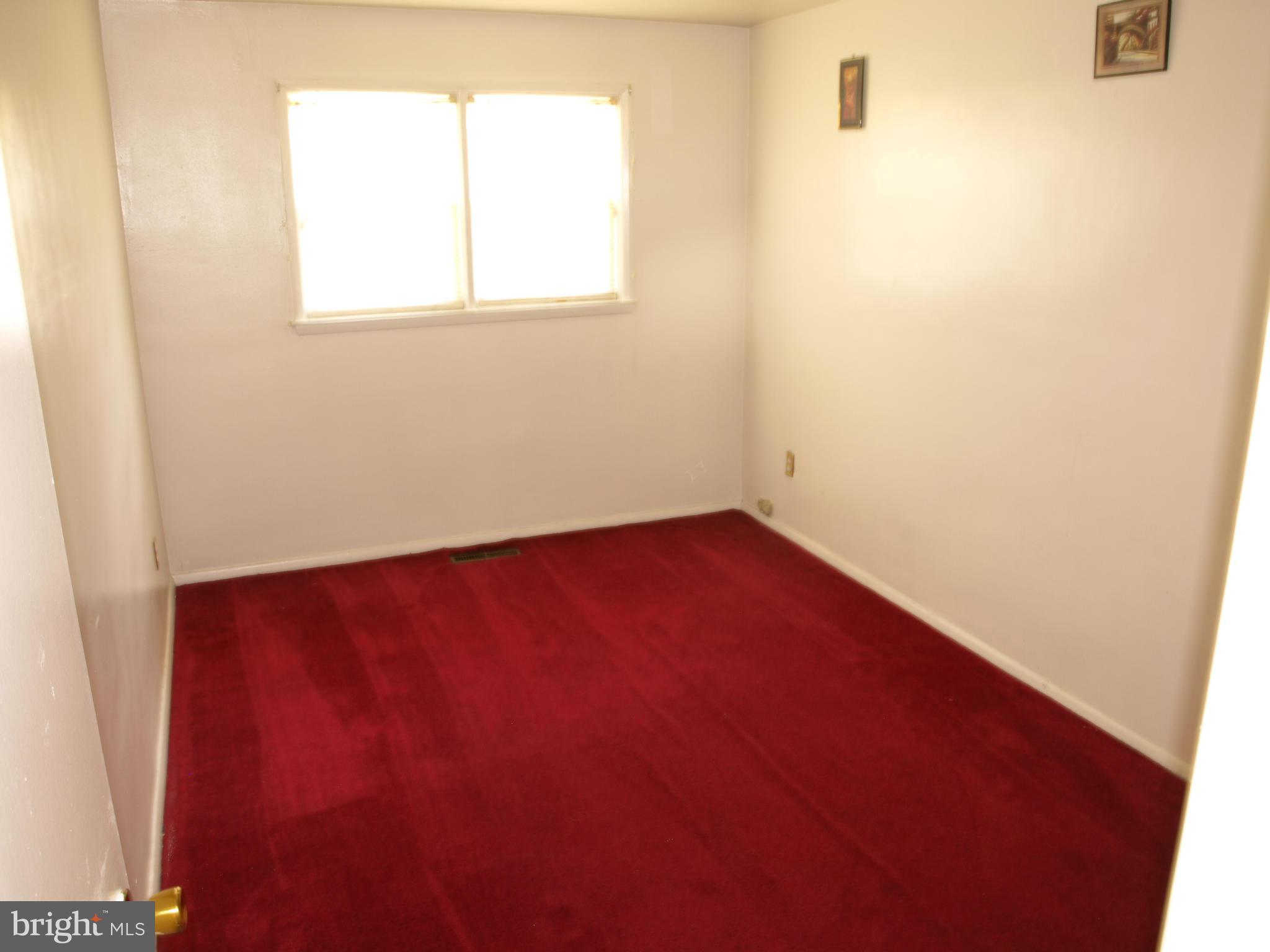 1211 Gettig Road Baltimore, MD 21237 - Photo 9 of 30 an empty room with a window