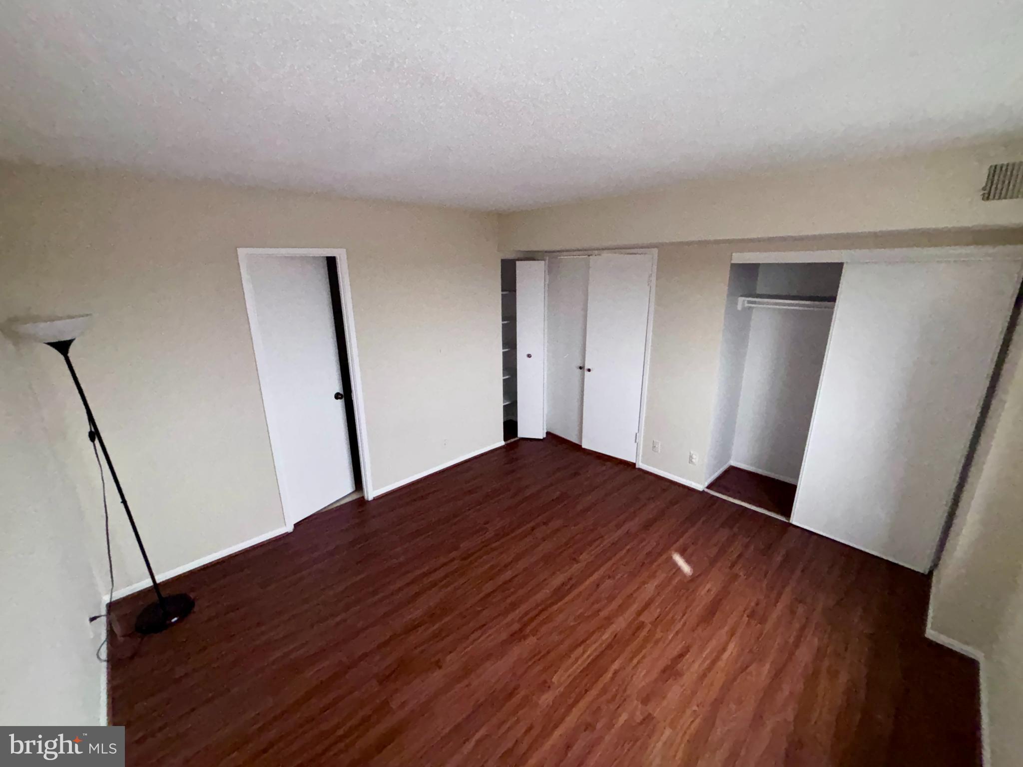 5901 Mt Eagle Drive, Unit 1009 Alexandria, VA 22303 - Photo 4 of 17 a view of empty room with wooden floor