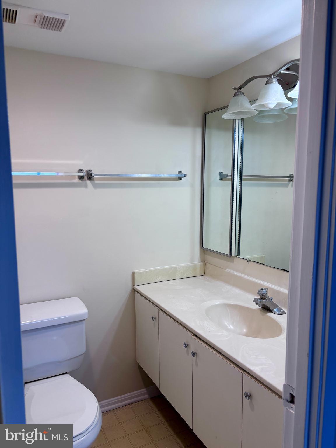 5901 Mt Eagle Drive, Unit 1009 Alexandria, VA 22303 - Photo 8 of 17 a bathroom with a sink toilet and shower