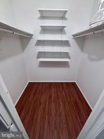 a view of a room with racks on the wall